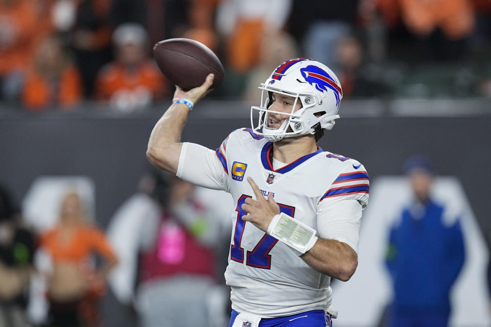 Buffalo Bills quarterback Josh Allen throws a pass against the Cincinnati Bengals during the first half of an NFL football game, Sunday, Nov. 5, 2023, in Cincinnati. (AP Photo/Darron Cummings)