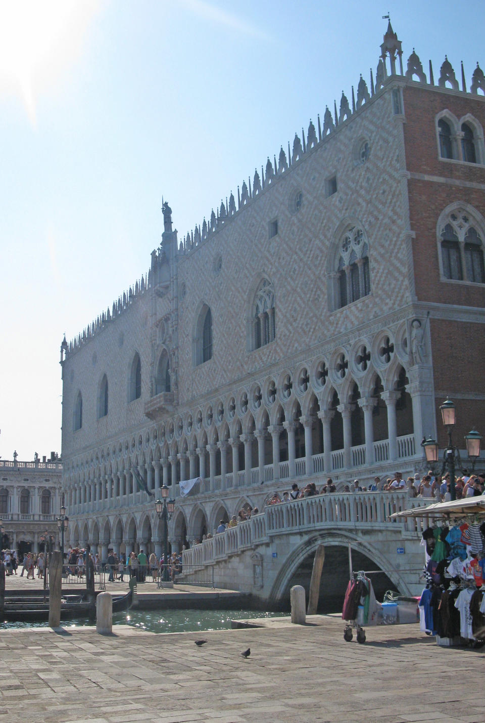 This July 15, 2012 photo shows tourists at the Palace of the Doges in the heart of Venice, Italy. To travel through northern Italy with a copy of Mark Twain’s 1869 ‘'The Innocents Abroad', his classic 'record of a pleasure trip'. It took him to the great sights of Europe and on to Constantinople and Jerusalem before he sailed home to New York. Such a trip would take far too big a chunk out of my holiday time. But, Milan, Florence and Venice, a mere fragment for Twain, was within my reach for a two-week vacation. (AP Photo/Raf Casert)