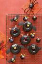 <p>Use any Halloween candy you have on hand to turn these chocolate donuts into creepy crawlers and critters. </p><p>Get the <strong><a href="https://www.womansday.com/food-recipes/food-drinks/a23460042/black-cat-bat-spider-and-mice-doughnuts-recipe/" rel="nofollow noopener" target="_blank" data-ylk="slk:Black Cat, Bat, Spider, and Mice Doughnuts recipe;elm:context_link;itc:0;sec:content-canvas" class="link ">Black Cat, Bat, Spider, and Mice Doughnuts recipe</a></strong> from Woman's Day.</p>