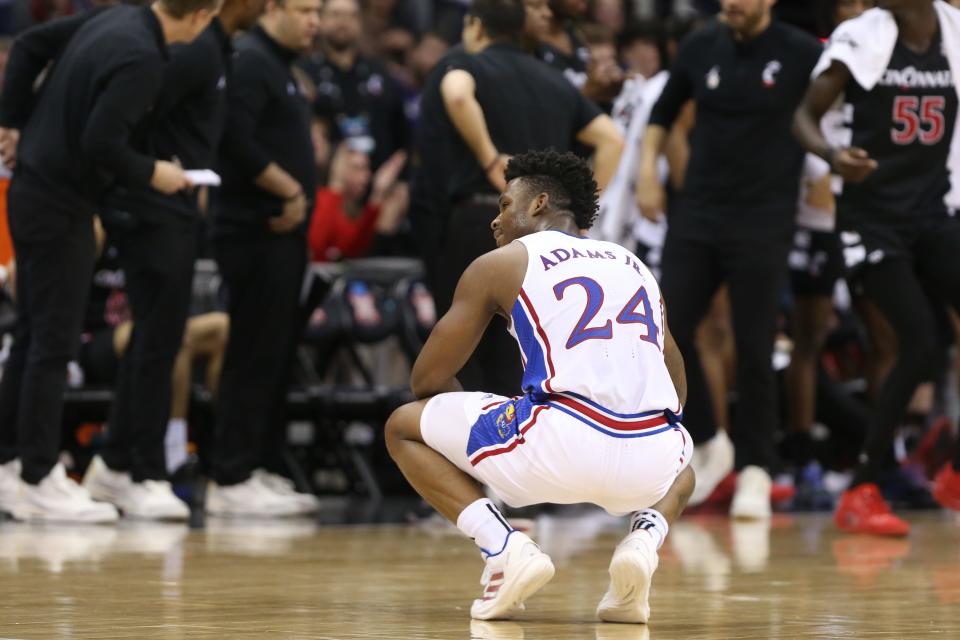 Kansas junior forward KJ Adams Jr. (24) reacts after a play against Cincinnati in the second half of a Big 12 Conference Tournament second round game Wednesday inside the T-Mobile Center in Kansas City.