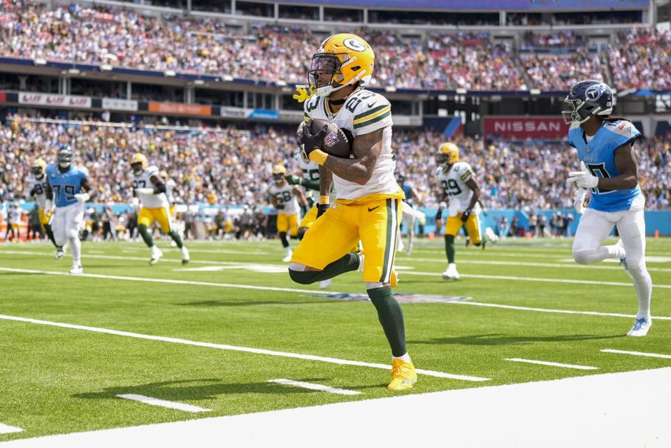 Green Bay Packers' Jaire Alexander returns an interception for a touchdown during the first half of an NFL football game against the Tennessee Titans Sunday, Sept. 22, 2024, in Nashville, Tenn. (AP Photo/George Walker IV)