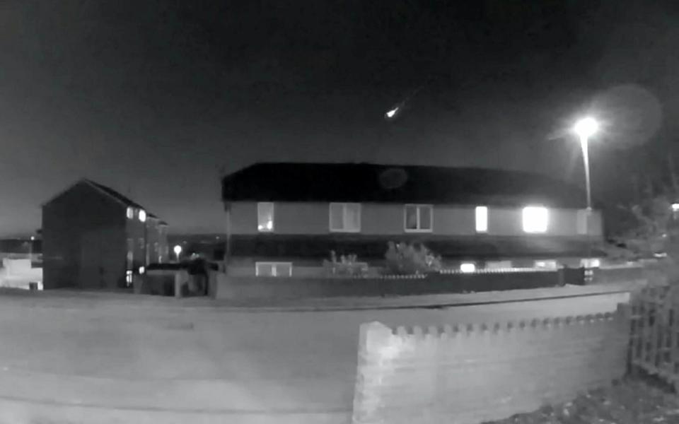 The moment the fireball was captured hurtling across the UK by a security camera in Barnsley - Alex Laycock/SWNS