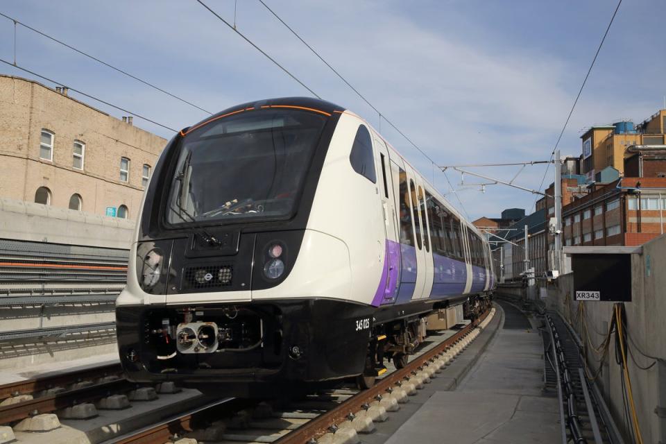 Elizabeth line test train passes through Custom House station (April 2018) (Crossrail Project)