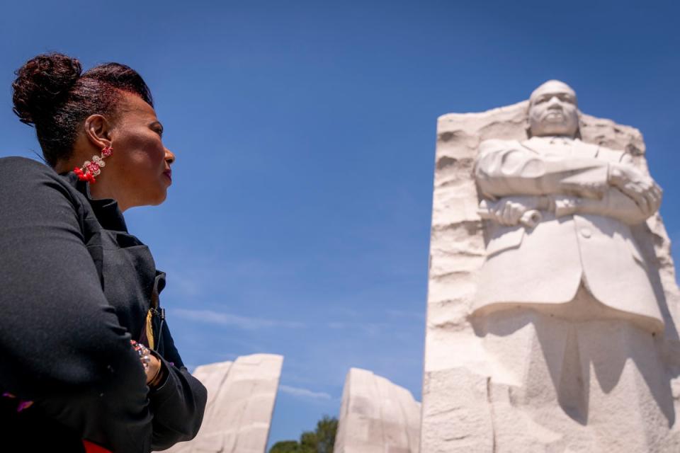 Dr Bernice King looks up at the statue of her father Dr Martin Luther King Jr (Copyright 2023 The Associated Press. All rights reserved)