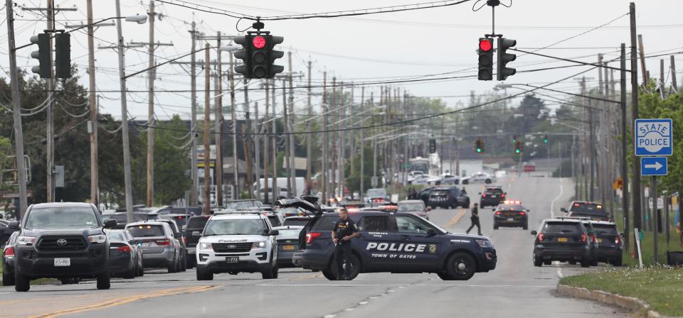 Monroe County Sheriffs, Rochester Police, New York State Police and several other first responders and policing agencies all respond to the 1200 block area of Scottsville Road for the report of a possible active shooter Friday, May 20, 2022. 