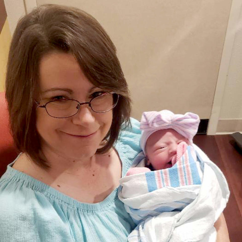 Image: Cathy Greninger holds her newborn granddaughter, Savannah. (Courtesy Cathy Greninger)
