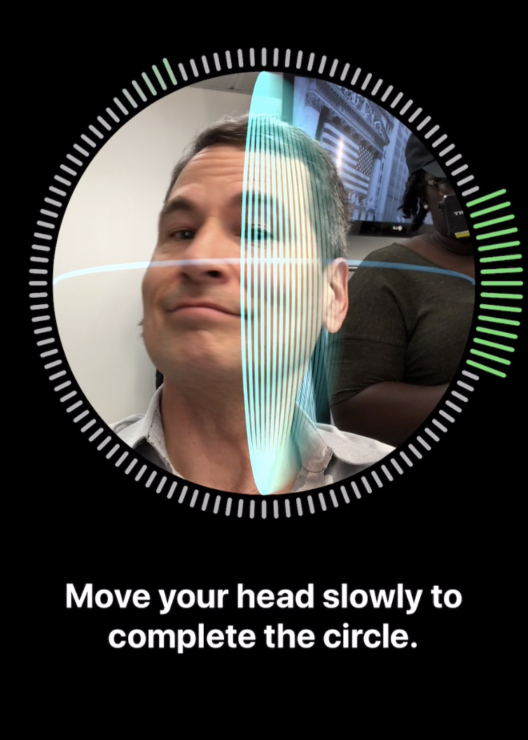 You train Face ID by letting it scan your head twice.