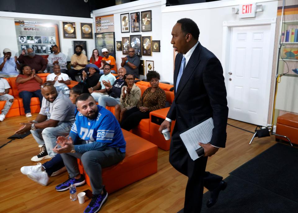 People look at and applaud ESPN's Stephen A. Smith of the First Take show as he walks in to do a broadcast from WGPR in Detroit on Friday, September 9, 2022.The live show had a studio audience made up of Detroit sports fans listening to Smith and Bart Scott, a former Southeastern High School and NFL player talk about football and other sports related topics.