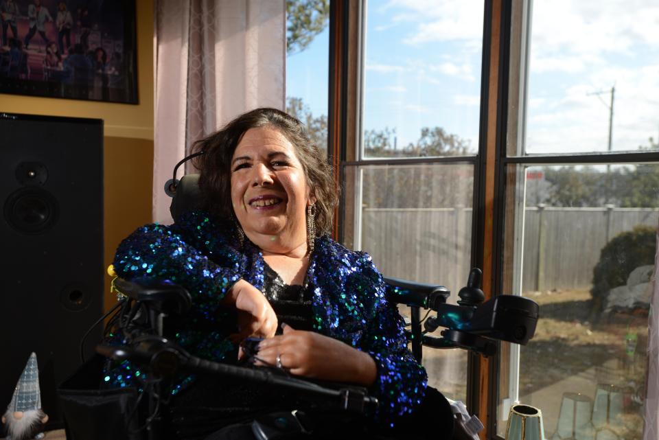 Musician Patricia "Pidgie" Panzarino, photographed at her East Wareham home, has a new solo album and an upcoming tour thanks to a 'miracle' medicine that has slowed her rare disease.