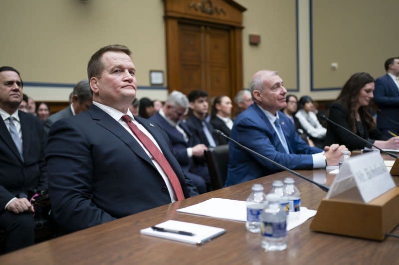 Tony Bobulinski (L), a former business partner of Hunter Biden, and Lev Parnas (R), a former associate of Rudy Giuliani, testify Wednesday during a House Oversight and Accountability Committee hearing as part of the House Republicans' impeachment inquiry into President Joe Biden at the U.S. Capitol. Photo by Bonnie Cash/UPI