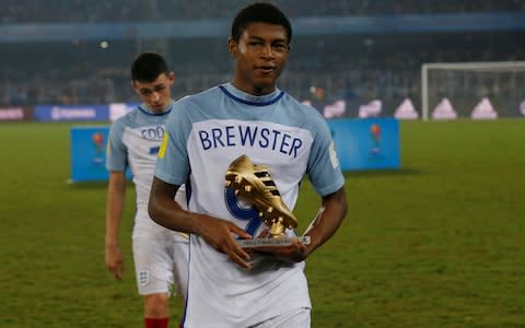 Rhian Brewster with his golden boot - Credit: Reuters