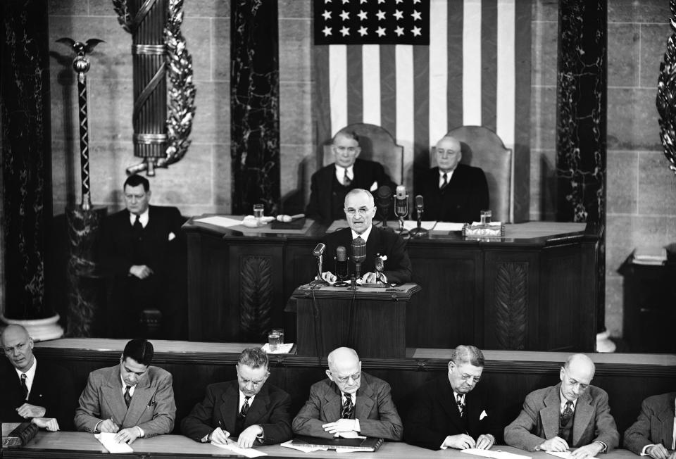 FILE - This Jan. 8, 1951 file photo shows President Harry S Truman giving his State of the Union address on Capitol Hill in Washington. Is “strong” losing its strength? Presidents of both parties have long felt compelled to sum up the state of the union with a descriptive word or two in their State of the Union addresses. Mostly the same word. For many years now, “strong” has been the go-to adjective. (AP Photo/Byron Rollins, File)