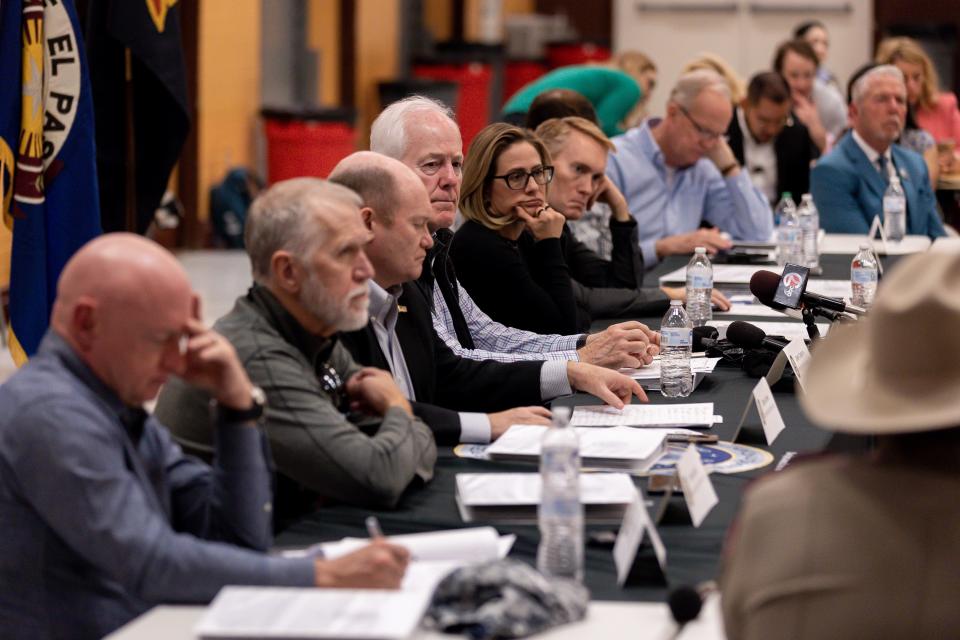 U.S. senators participate in a roundtable discussion with officials from the city of El Paso, local nonprofits, law enforcement officials, businesses and other stakeholders at the Emergency Migrant Operations Facility located in the closed Bassett Middle School in El Paso on Monday.