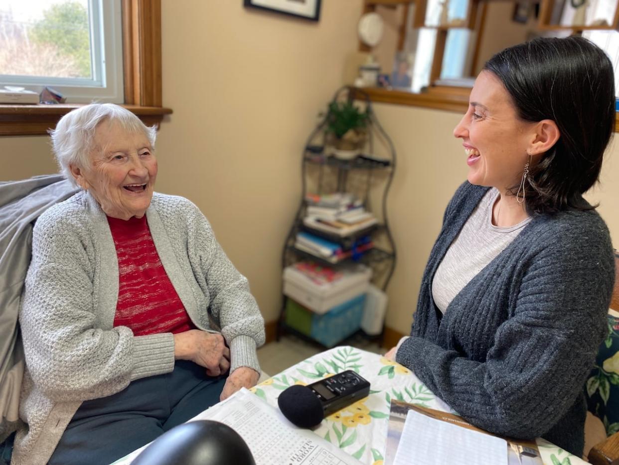 Fieldworker Amber Buchanan interviews native Gaelic speaker Jean MacKay at her home in Westmount, N.S. (Amber Buchanan - image credit)