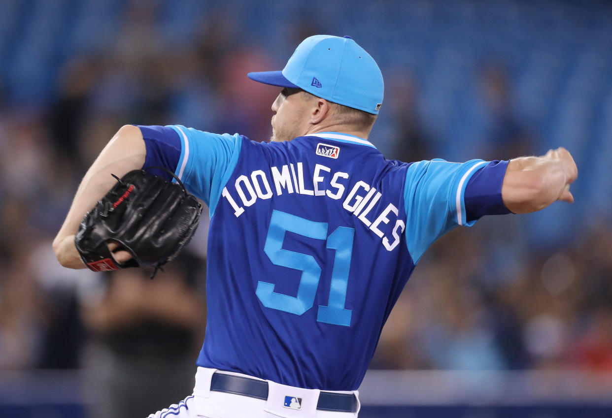 TORONTO, ON - AUGUST 24: Ken Giles #51 of the Toronto Blue Jays wears a nickname on the back of his jersey on Players Weekend as he delivers a pitch in the ninth inning during MLB game action against the Philadelphia Phillies at Rogers Centre on August 24, 2018 in Toronto, Canada. (Photo by Tom Szczerbowski/Getty Images)