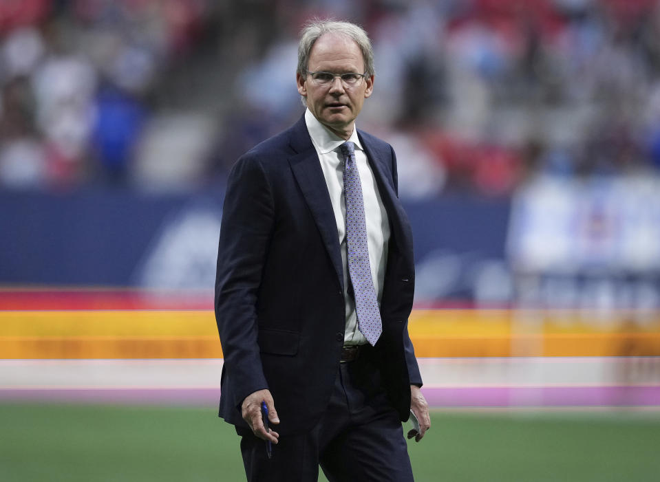 Seattle Sounders coach Brian Schmetzer leaves the field at halftime of the team's MLS soccer match against the Vancouver Whitecaps on Saturday, July 8, 2023, in Vancouver, British Columbia. (Darryl Dyck/The Canadian Press via AP)