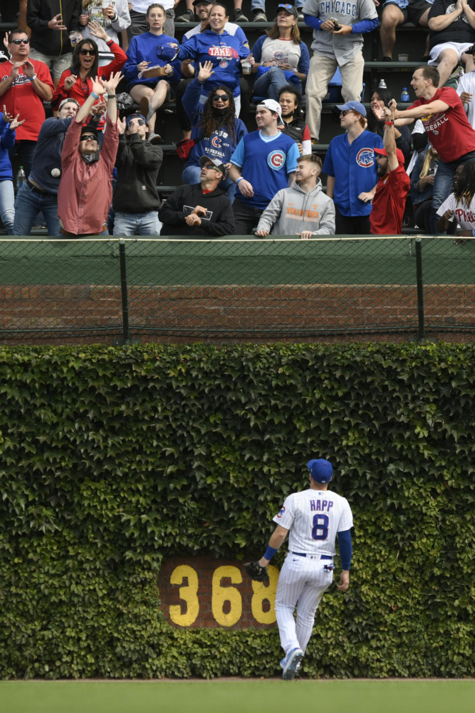 Chicago Cubs outfielder Ian Happ watches St. Louis Cardinals' Harrison Bader's solo home run during the second inning of a baseball game Saturday, Sept. 25, 2021. (AP Photo/Paul Beaty)