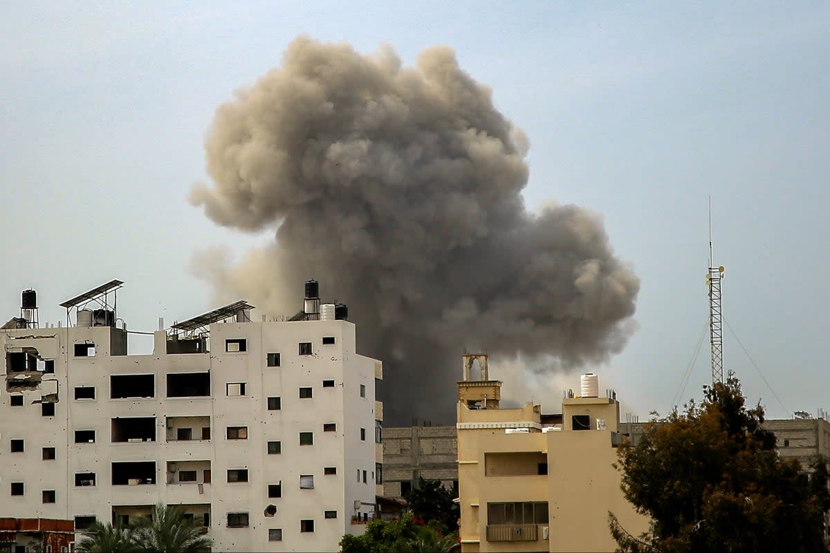 Smoke rises above buildings during an Israeli strike in the vicinity of the Al-Shifa hospital in Gaza City (AFP via Getty)