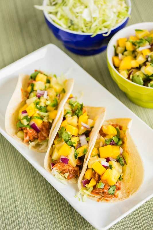 <p>Juggling Act Mama</p><p>Put a twist on taco night with this delicious BBQ chicken taco recipe. </p><p><strong>Get the Recipe: <a href="https://www.jugglingactmama.com/bbq-chicken-tacos-recipe/" rel="nofollow noopener" target="_blank" data-ylk="slk:Slow Cooker BBQ Chicken Tacos;elm:context_link;itc:0;sec:content-canvas" class="link ">Slow Cooker BBQ Chicken Tacos</a></strong></p>