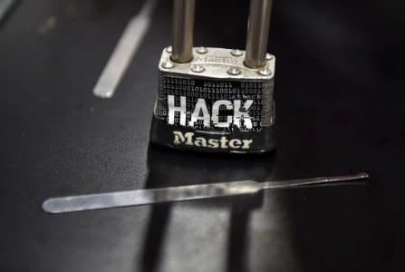 A padlock is displayed at the Alert Logic booth during the 2016 Black Hat cyber-security conference in Las Vegas, Nevada, U.S. August 3, 2016.  REUTERS/David Becker