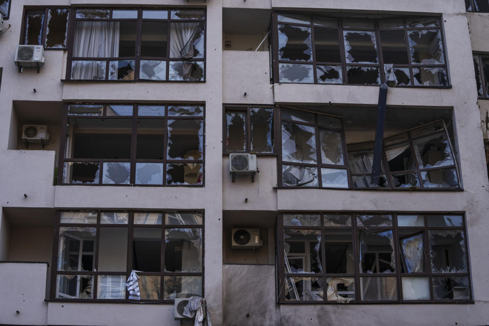 FILE - Damage at the scene of a residential building following explosions, in Kyiv, Ukraine, June 26, 2022. While much of the attritional war in Ukraine’s east is hidden from sight, the brutality of Russian missile strikes in recent days on the mall in the central city of Kremenchuk and on residential buildings in the capital, Kyiv, were in full view to the world and especially to Western leaders gathered for a trio of summits in Europe. (AP Photo/Nariman El-Mofty, File)