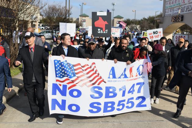 Texas state Rep. Gene Wu; Houston Mayor Sylvester Turner, Reps. Al Green and Sheila Jackson Lee, join a protest in Houston against a bill that would forbid Chinese nationals from buying properties in Texas, on Feb. 11.