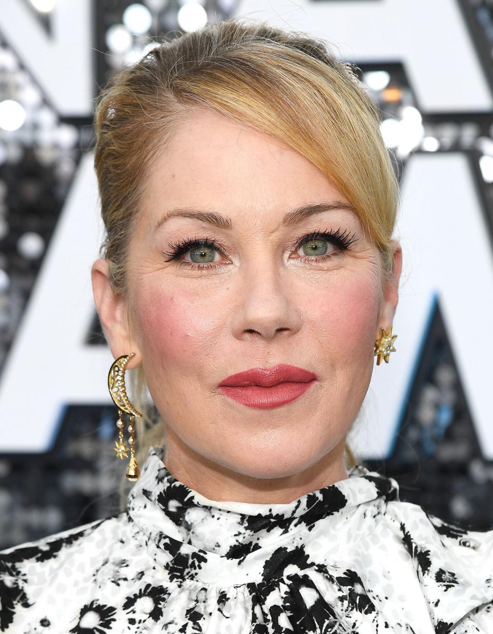 Christina Applegate's Mismatched Earrings