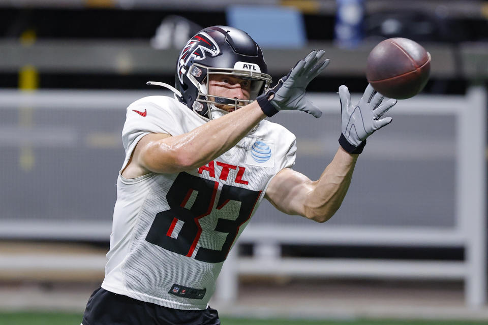 FILE - Atlanta Falcons wide receiver Jared Bernhardt (83) runs through a drill during the teams open practice in Atlanta, Ga. Monday, Aug. 15, 2022. Just two years after being honored as the nation’s top college lacrosse player, Bernhardt is trying to make it as an NFL receiver with the Atlanta Falcons. (AP Photo/Todd Kirkland, File)