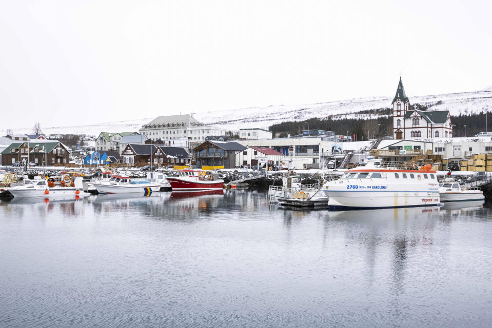 A view of Húsavík harbor appears in Iceland, Thursday, April 8, 2021. "Húsavík (My Hometown)", a song from the film "Eurovision Song Contest: The Story of Fire Saga," is nominated for an Oscar for best original song. The people of Húsavík, a town of only 2,300, have staged a grassroots Oscar campaign on behalf of the song and adopted it as a de facto local anthem. (AP Photo/Brynjar Gunnarsson)