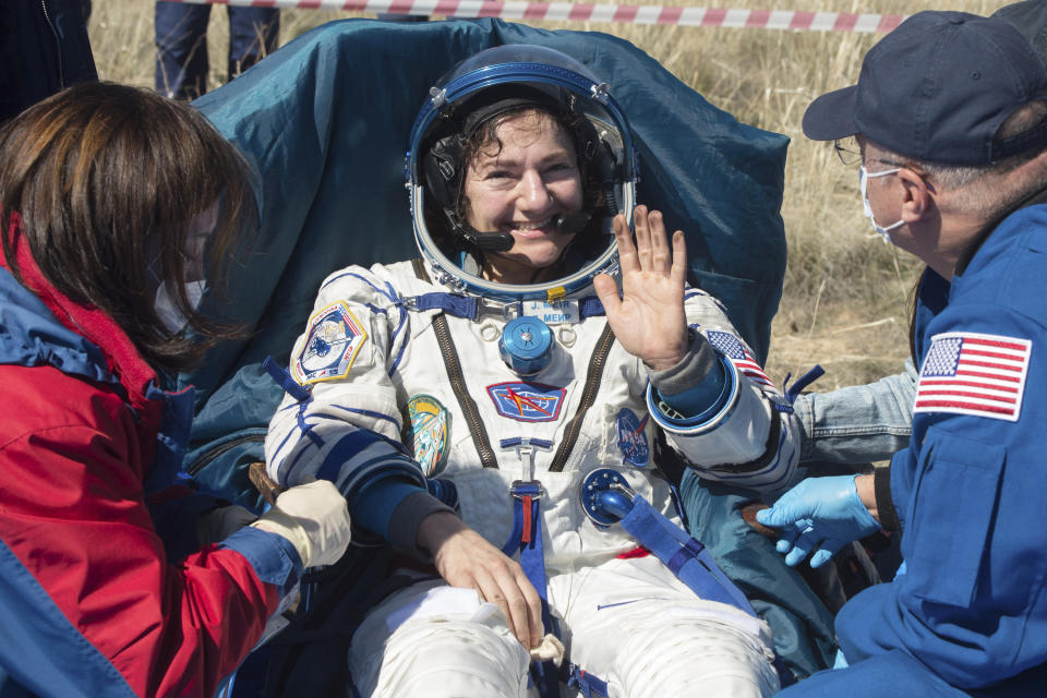 In this handout photo released by Gagarin Cosmonaut Training Centre (GCTC), Roscosmos space agency, U.S. astronaut Jessica Meir waves shortly after the landing of the Russian Soyuz MS-15 space capsule near Kazakh town of Dzhezkazgan, Kazakhstan, Friday, April 17, 2020. An International Space Station crew has landed safely after more than 200 days in space. The Soyuz capsule carrying NASA astronauts Andrew Morgan, Jessica Meir and Russian space agency Roscosmos' Oleg Skripochka touched down on Friday on the steppes of Kazakhstan. (Andrey Shelepin, Gagarin Cosmonaut Training Centre (GCTC), Roscosmos space agency, via AP)