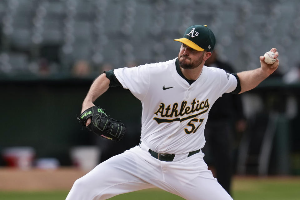 Oakland Athletics pitcher Alex Wood throws to a Texas Rangers batter during the first inning of a baseball game Monday, May 6, 2024, in Oakland, Calif. (AP Photo/Godofredo A. Vásquez)