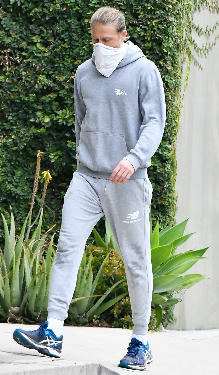 <p>Charlie Hunnam steps out in an all-gray track suit on Monday in Los Angeles.</p>