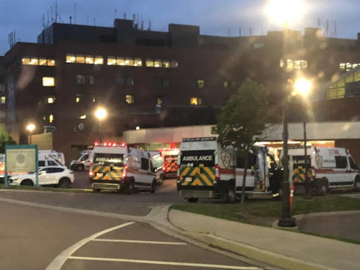 A photo posted on Facebook appears to show multiple ambulances waiting to offload patients at the Moncton Hospital. (Facebook/Ryan Steele - image credit)