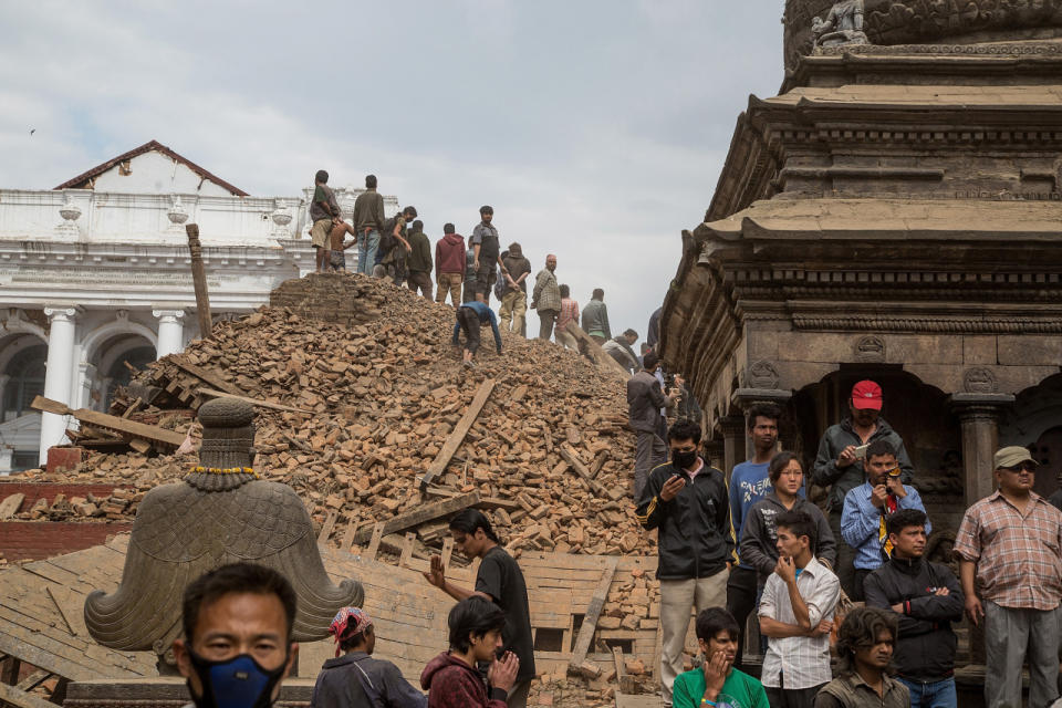 Strong earthquake and aftershocks shake Nepal A powerful earthquake struck Nepal Saturday, killing at least 1,180 people across a swath of four countries as the violently shaking earth collapsed houses, leveled centuries-old temples and triggered avalanches on Mt. Everest. It was the worst tremor to hit the poor South Asian nation in over 80 years. At least 1,130 people were confirmed dead across Nepal, according to the police. Another 34 were killed in India, 12 in Tibet and two in Bangladesh. Two Chinese citizens died in the Nepal-China border. The death toll is almost certain to rise, said deputy Inspector General of Police Komal Singh Bam. (AP) Photography by Omar Havana/Getty Images See more earthquake photos and our other slideshows on Yahoo News.