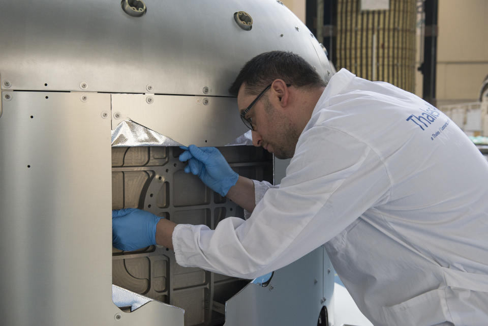 ITALY, TURIN, PIEDMONT - 2019/03/20: A worker at work on the Airlock commercial space envelope during the press presentation for the International Space Station at Thales Alenia Space headquarters.
The NanoRacks Airlock Module built with Turin's Thales Alenia Space is the very first commercial Airlock that will operate on the International Space Station. It will be a permanent commercial form on board the International Space Station. The module could also be removed from the Space Station and used for future commercial platforms as part of the NanoRacks Space Outpost Program. The Airlock is ready for launch with the SpaceX CRS-21 service mission scheduled for January 2020. (Photo by Stefano Guidi/LightRocket via Getty Images)