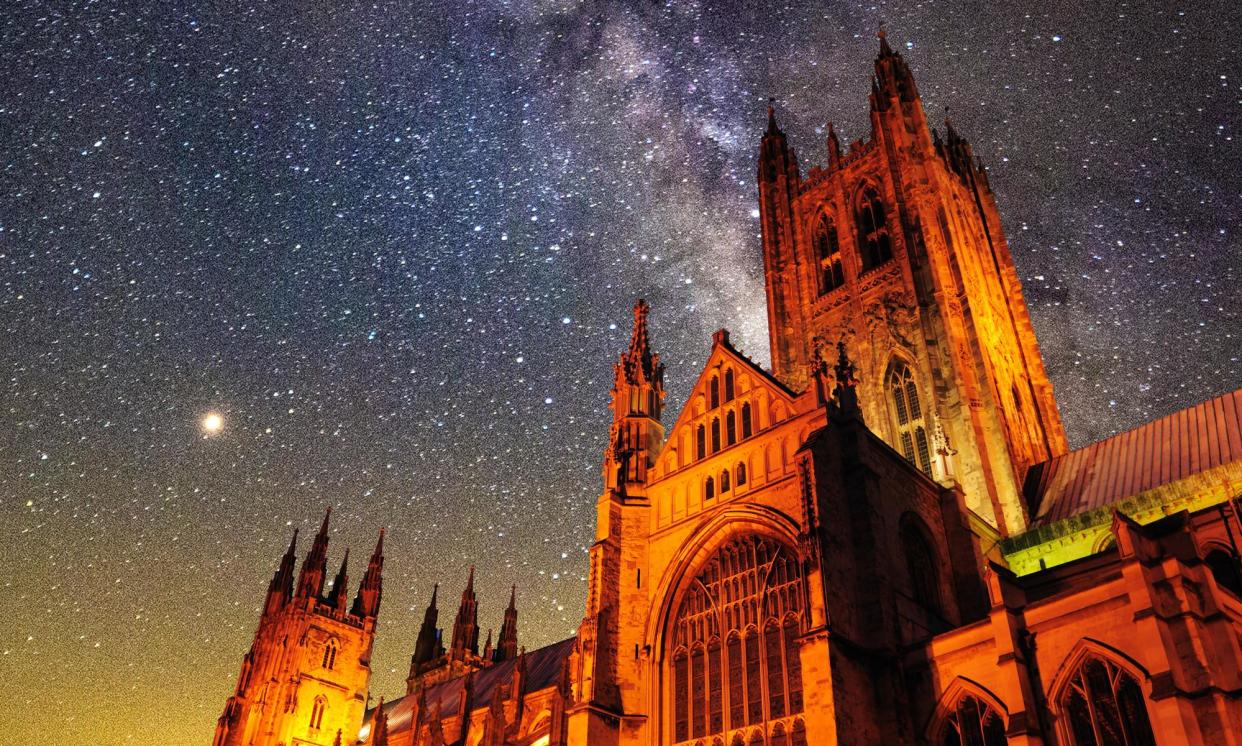 <span>A composite image of Canterbury Cathedral floodlit at dusk and the Milky Way photographed from Mount Olympus in Greece.</span><span>Photograph: Jonathan Garland/Alamy; Nicolas Economou/NurPhoto/Getty Images</span>