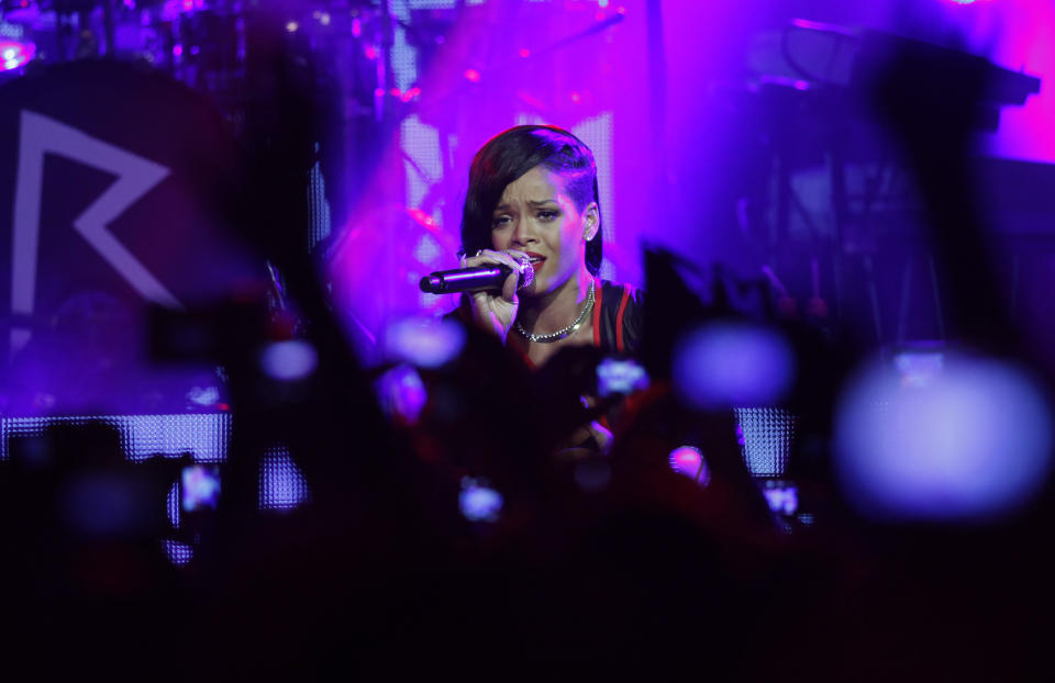 Barbadian singer Rihanna performs during the first stop of her 777 worldwide tour at the Plaza Condesa in Mexico City, Wednesday, Nov. 14, 2012. (AP Photo/Marco Ugarte)