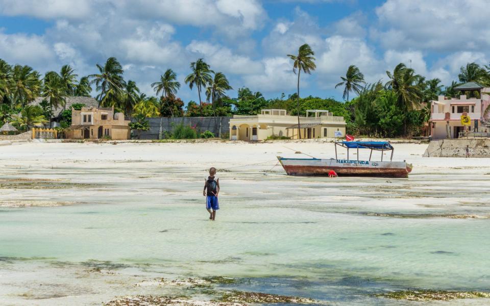 Zanzibar's heady mix of Arabic, African and colonial cultures adds real exoticism to a beach break - Alamy