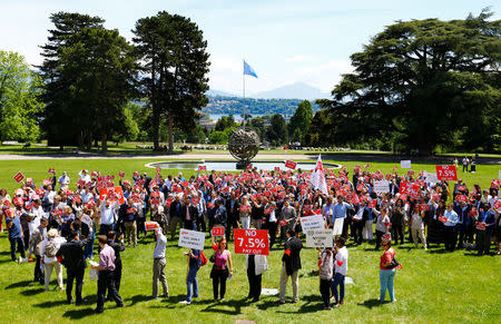 United Nations and other agencies staff demonstrate against a planned 7,5 % salary cut at the U.N. in Geneva, Switzerland, May 24, 2017. REUTERS/Denis Balibouse