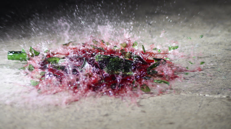 Wine bottle smashing on floor