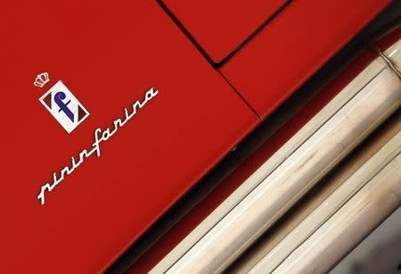 A Pininfarina logo is pictured at the Casa Enzo Ferrari museum during a media preview in Modena, northern Italy, March 9, 2012. REUTERS/Alessandro Bianchi