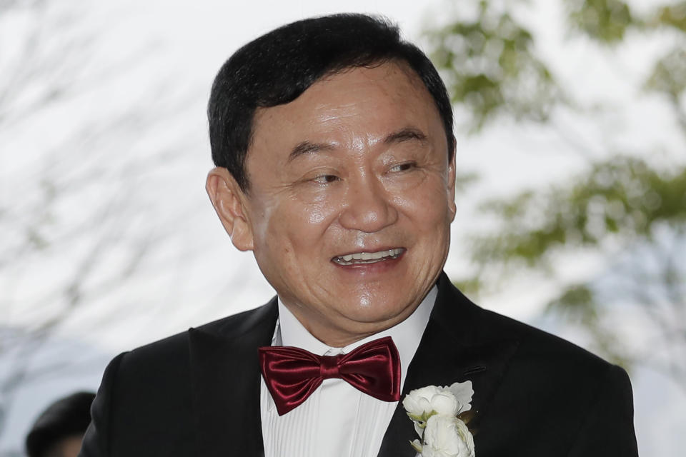 FILE - Former Thai Prime Minister Thaksin Shinawatra welcomes his guests for the wedding of his youngest daughter Paetongtarn "Ing" Shinawatra at a hotel in Hong Kong on March 22, 2019. Thaksin attended a birthday party for outgoing Cambodian Prime Minister Hun Sen in Phnom Penh, according to video posted online Sunday, Aug. 6, 2023, a day after Thaksin said he would delay plans to return to Thailand following years of self-imposed exile. (AP Photo/Kin Cheung, File)