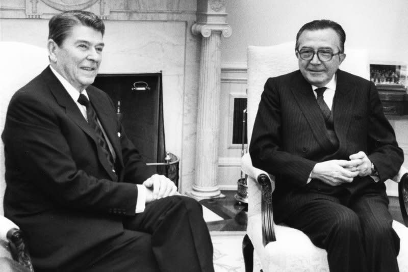 President Ronald Reagan (L) meets with Italian Prime Minister Giulio Andreotti in the Oval Office of the White House on February 2, 1987. On March 29, 1991, Andreotti quit, opening the way for the country's 50th government since World War II. File Photo by Tim Clary/UPI