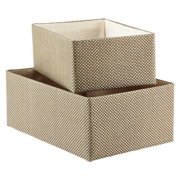 Get them <a href="https://www.containerstore.com/s/storage/decorative-bins-baskets/sage-silver-woven-kiva-storage-bins/12d?productId=11000116" target="_blank">here</a>.