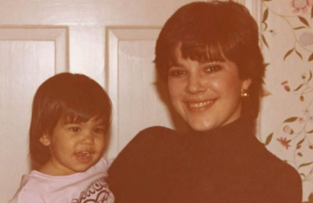 Kourtney Kardashian remembered her aunt Karen Houghton with sweet childhood photo credit:Bang Showbiz