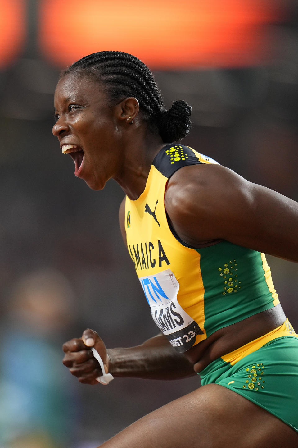 Danielle Williams, of Jamaica celebrates after winning the gold medal in the final of the Women's 100-meters hurdles during the World Athletics Championships in Budapest, Hungary, Thursday, Aug. 24, 2023. (AP Photo/Petr David Josek)