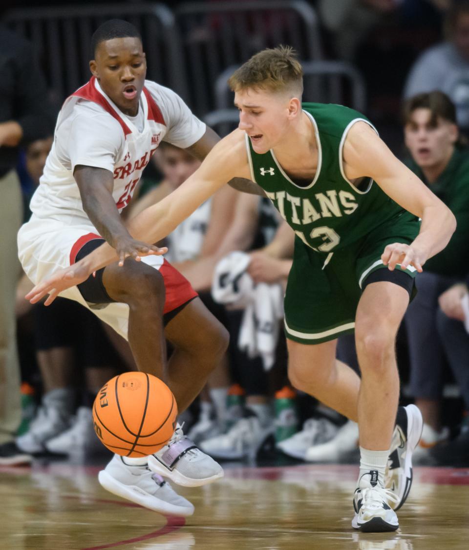 Bradley's Duke Deen, left, knocks the ball away from Illinois Wesleyan's David Williams in the second half of their exhibition game Wednesday, Nov. 2, 2022 at Carver Arena.