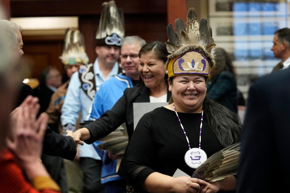 Clarissa Sabattis, Chief of the Houlton Band of Maliseets, foreground, and other leaders of Maine's tribes are welcomed by lawmakers into the House Chamber, Wednesday, March 16, 2023, at the State House in Augusta, Maine. Rena Newell, Chief of the Passamaquoddy Tribe at Sipayik, Edward Peter Paul, Chief of the Aroostook Band of Mi'kmaqs, Kirk Francis, Chief of the Penobscot Nation, and William Nicholas, Chief of the Passamaquoddy Tribe at Motahkomikuk, follow behind.