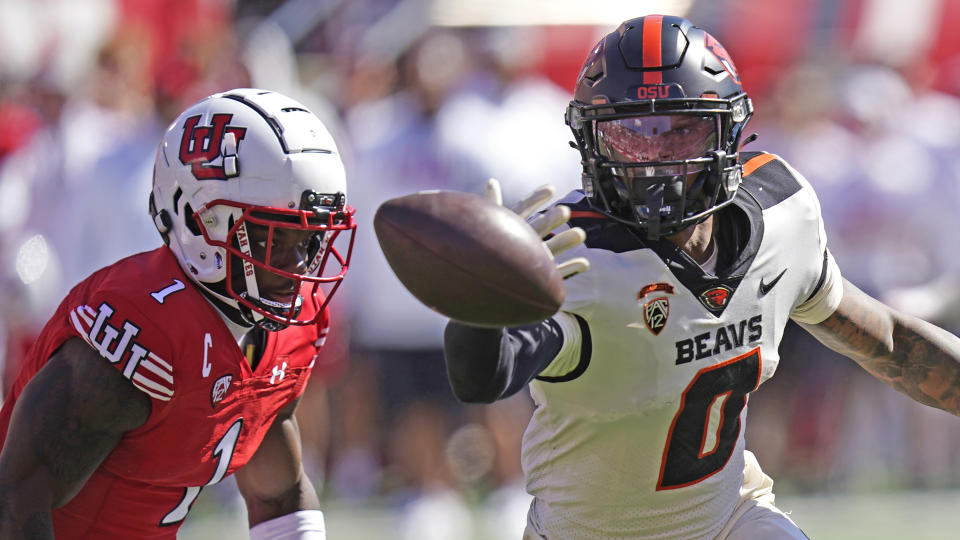 Utah cornerback Clark Phillips III guards Oregon State wide receiver Tre'Shaun Harrison (0) during the second half of an NCAA college football game Saturday, Oct. 1, 2022, in Salt Lake City. (AP Photo/Rick Bowmer)