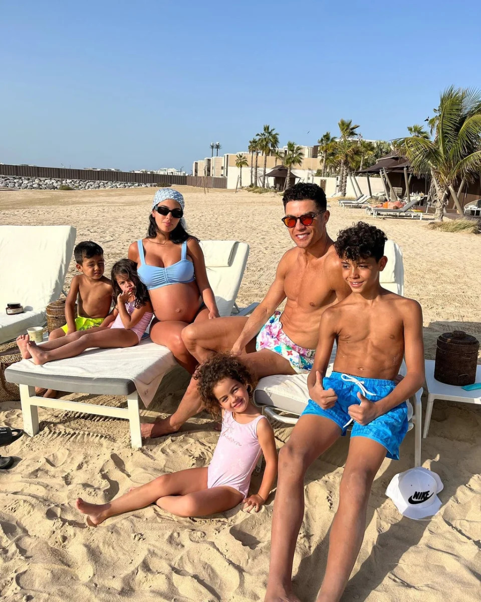 Georgina Rodriguez while pregnant, pictured with Cristiano and her Alana, four, as well as Cristiano Jr, 11, and twins Eva and Mateo, four, who Cristiano had via surrogacy (Instagram)